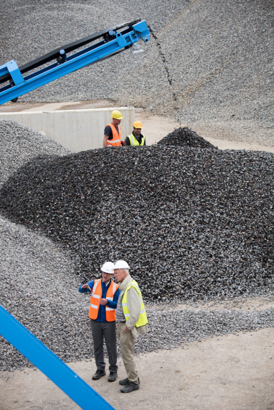 Technology photography: Modern recycling plants for building materials sort the extracted stones exactly according to size and layer the material in separate heaps.