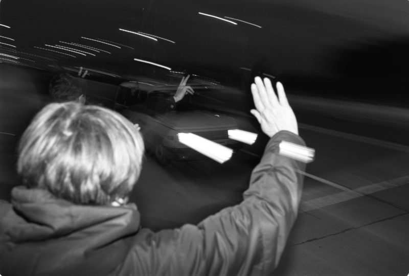 Reportage photographyGDR border opening in 1989: Vehicles from the GDR drive across the open border at the Helmstedt/Marienborn border crossing and are greeted by waving West Germans.Editorial photography: GDR border opening in 1989: Vehicles from the GDR drive across the open border at the Helmstedt/Marienborn border crossing and are greeted by waving West Germans.