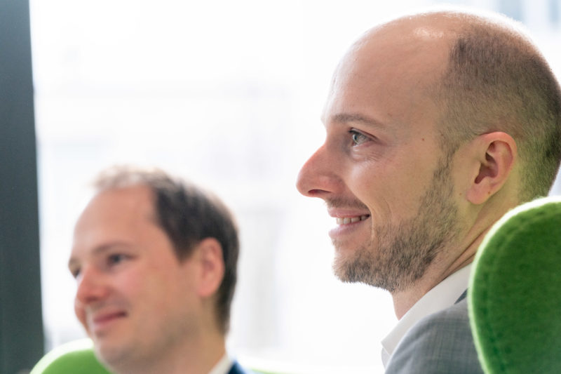 Talking pictures: Interview with executives: Double portraits work well when both people in the picture laugh synchronously.