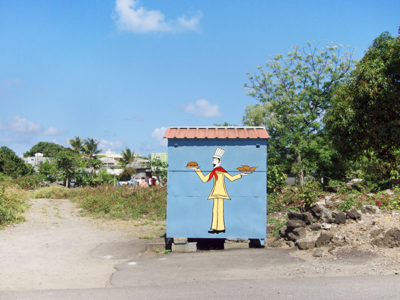 travel photography: Mauritius: A closed snack bar on a street in the country.