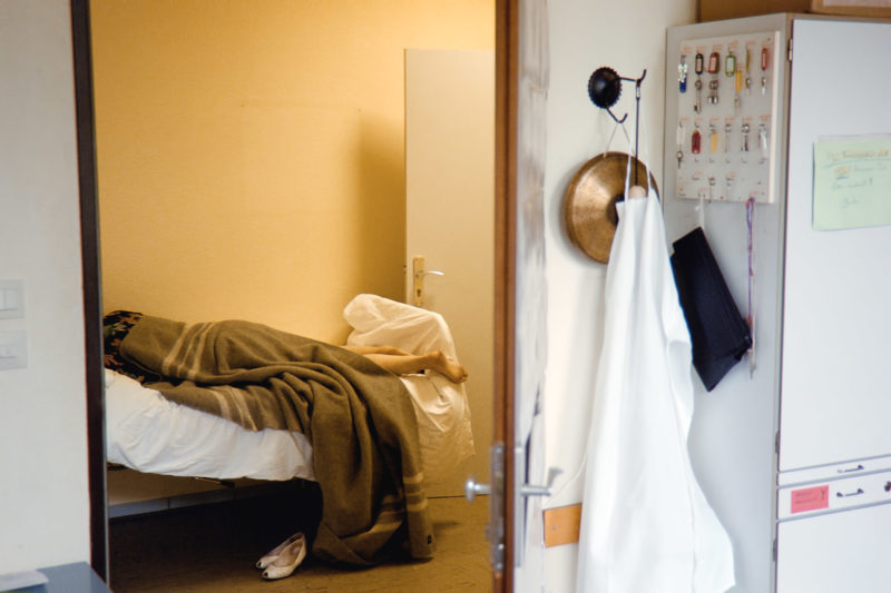 editorial photography at a psychiatric ward: View from the duty room to a patient