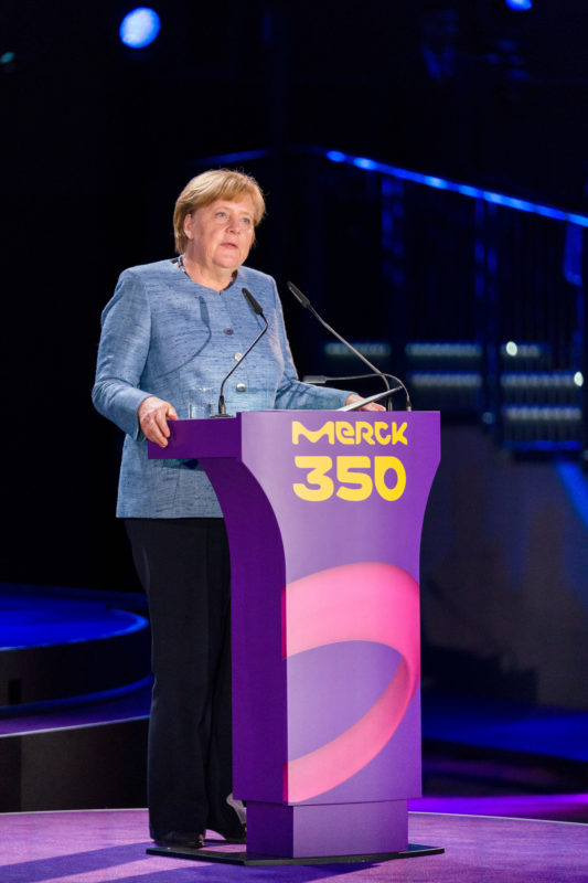 editorial photography: German Chancellor Angela Merkel at the celebration of the 350th anniversary of Merck in Darmstadt. She gives the speech.