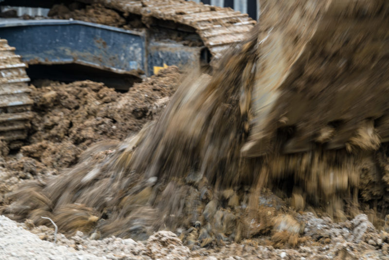 Personal photography: An excavator moves earth.