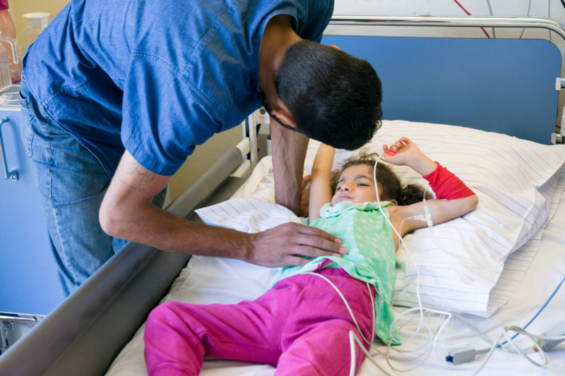 Healthcare photography: n the cardiac catheter laboratory of the paediatric cardiology department of the Homburg University Hospital (Saar), a girl is being prepared for surgery.